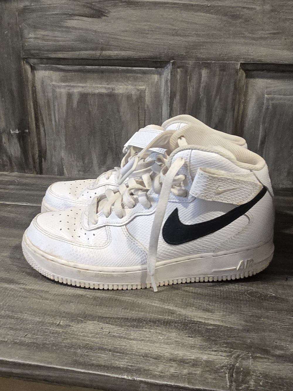 Nike Kids' White High-Top Sneakers with Black Swoosh